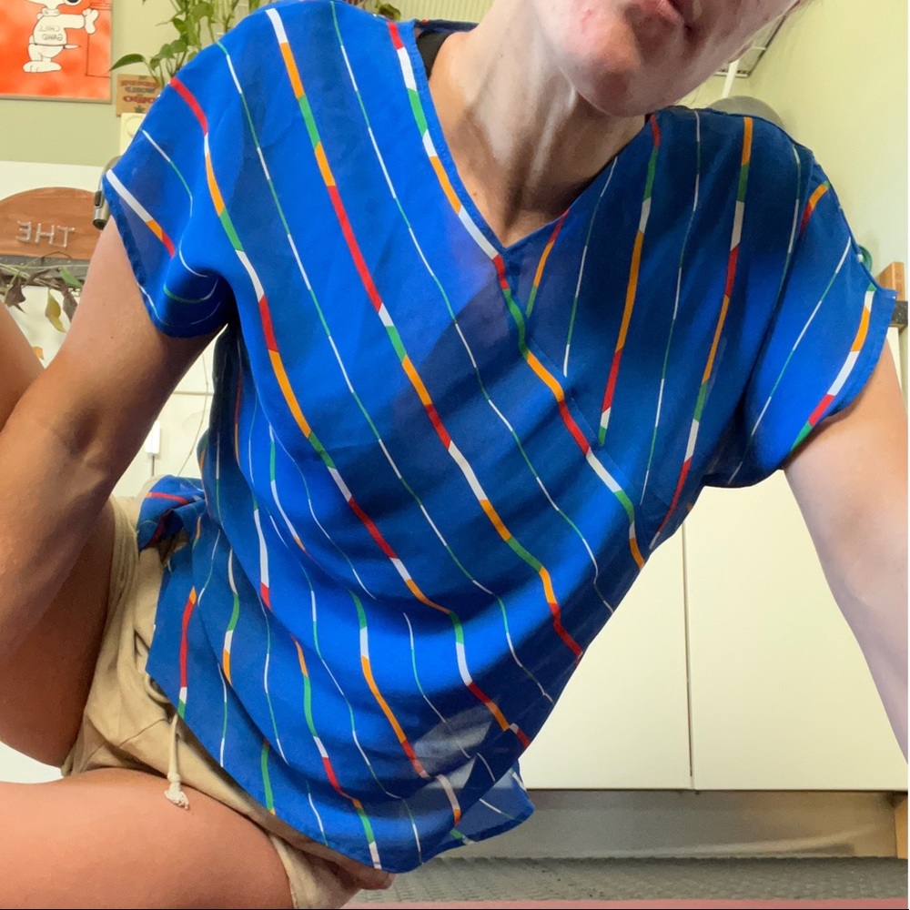 Vintage cap sleeve shirt. Fits small/medium